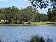 looking across Yarramundi Reach waters to Weston Park Canberra
