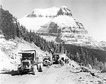 Road construction along the Going-to-the-Sun Road with Going to the Sun Mountain in background, 1932