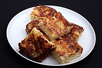 Chennapoda is a popular baked paneer cheese-cake from India