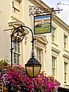 The Warwick Castle sign