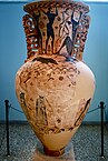 Fig. 2. Two wingless cauldron-headed Gorgons with wasp-shaped bodies chase Perseus (on the body of the vase below the neck); Eleusis Amphora, Eleusis, Archaeological Museum 2630 (mid seventh century BC)[62]