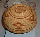 Late 19th-century Hupa woman's cap, bear grass and conifer root, Stanford University