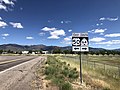 Eastbound US 50 arrives at a T-intersection at the edge of Holden and turns left, and the SR-64 is to the right (May 2020)