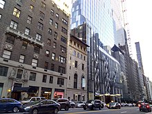 165 West 57th Street as viewed from Seventh Avenue, with One57 immediately behind it