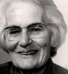 Elderly woman with spectacles, smiling