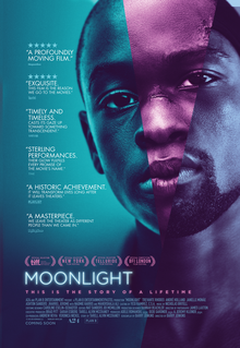 A multicolored monochrome close image of Chiron (Portrayed by Alex Hibbert, Ashton Sanders, and Trevante Rhodes), in three different stages of his life, as a child, teenager, and young adult. Accolades and excerpts of text from film reviews can be seen in the poster. The film's tagline reads "This is the story of a lifetime".