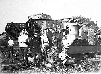 Soldiers of the anti-Bolshevik Volunteer Army before the Mark IV tank 'General Drozdovsky', South Russia 1920