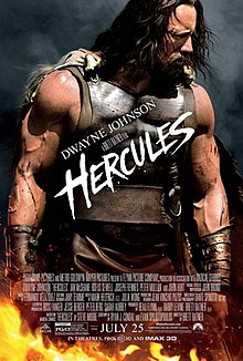 The titular Hercules stands in a smokey and fiery space.