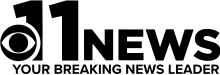 A sans serif 11 with a circle cut out of it to accommodate the CBS eye. The word "NEWS" is written next to 11. Beneath both elements is the slogan "Your Breaking News Leader".