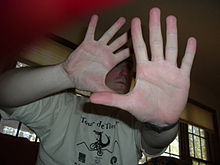 Photograph of Eric Piotrowski, c. 2005, wearing a t-shirt from the Tour de Timor.