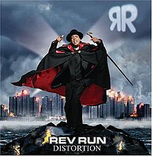 The cover features Rev Run wearing a black suit, cape and hat, holding a cane on top of a small rock island. Behind him is a city skyline and a spotlight showing Rev Run's initials. The artist's name and album title appear below him.