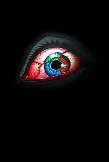 An eyeball with an iris of multiple colors on a black background
