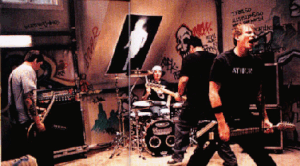 The group during the music video for "I Feel So". Left to Right : David Kennedy, Travis Barker, Anthony Celestino, Tom Delonge