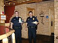 Police Officers serve meals during a fundraising event.