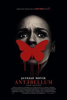 A woman's face. A dripping red painted silhouette of a butterfly covers her mouth.