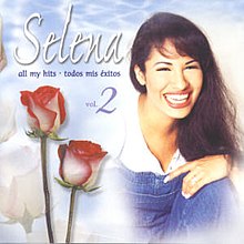 Album artwork of All My Hits: Todos Mis Éxitos Vol. 2 featuring a picture of Selena smiling and two red roses nearer to the left.