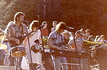 Performing in Dunedin, 1986. L-R: Rob Hellriegel, Jan Hellriegel, Mark Petersen, David Wood (Kevin Fielden obscured)