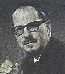Black and white portrait photograph of Isaac Cohen wearing spectacles