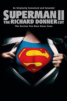 Beneath the film title, the torso of Superman wearing a suit and white shirt is shown. The shirt is pulled apart to reveal a large red 'S' symbol.