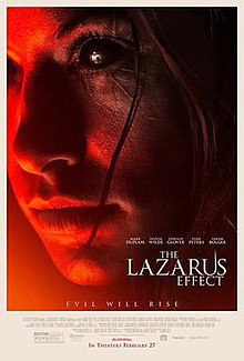 The right side of a woman's face with fully black eyeballs with scarring all around that same eye. The words "The Lazarus Effect" are at the bottom right in white, 5 cast member names above the title, and the tagline "Evil Will Rise" at the bottom middle.