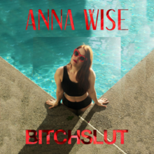 Picture of Anna Wise in a swimming pool with red text reading as "BitchSlut" at the bottom and "Anna Wise" at the top