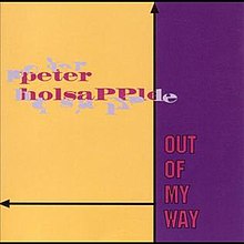 A cover with yellow and purple on the background and the artist name and title in red