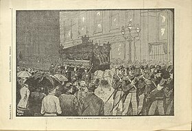 An etching of the scene of Miss Fanny Parnell’s funeral parade found in the periodical. The scene shows the mourning carriage with mutes sitting atop of it walking behind soldiers with a crowd watching.