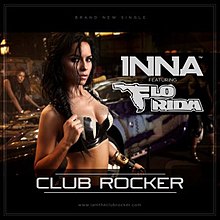 Shot of Inna wearing a black–white bra in front of a car. Information about the song is superimposed on her right.