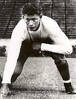 Player crouching, one hand on the ground