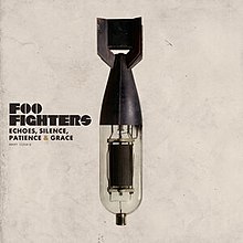 A bomb with its bottom half replaced by an amplifier tube. The text "Foo Fighters" and "Echoes, Silence, Patience & Grace" are to the left.