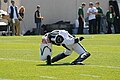 The Michigan State University drum major performs a backbend.