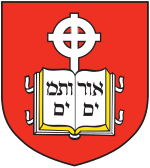 Coat of arms of the school, containing a book device inscribed with Hebrew letters and cross in front of a red background
