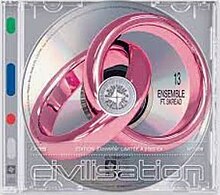 A grey CD. At the center of the CD, two pink rings are here with the words "13 - ENSEMBLE FT. SKREAD" written under.