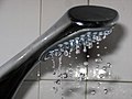 Water droplets forming out of a shower head