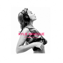 A small image of a woman (Kylie Minogue) wearing a crop top, taken in black-and-white. The song's title and artist name is superimposed on her.