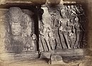 In this 1871 photograph, in the right panel, Shiva (four-handed in the middle) is shown assisting Ganga (on the left) in her descent to (or arrival on) earth from heaven. On the right are shown Parvati, Shiva's consort and in the top right, Brahma, Vishnu and Shiva, the three major male deities of Hinduism, watch. Sculpture is from 6th century CE.