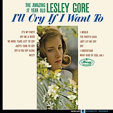Words explicating the artist, title, and track listing against a white background surround a narrow photo of a young woman looking sorrowful with out-of-focus tree flowers in the foreground.