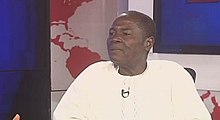 Headshot of James Oyedeji in a TV station