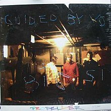 The cover of Propeller #127, a photograph of Robert Pollard, Jim Pollard, and Mitch Mitchell standing in a basement.