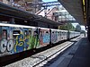 A side view of the 1980 built MB100 cars on a Laurentina bound train