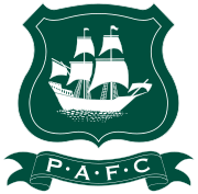 Plymouth Argyle's crest: The initials " underneath a shield featuring a ship called the Mayflower in full sail.