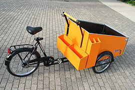 Cargo trike specially equipped for street cleaning crews; The side and rear compartments carry pick-up sticks, bag holders and other gear.