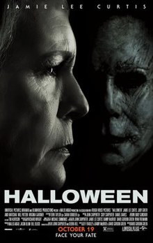 A woman with a worried face looks ahead, with the face of Michael Myers closely near her.