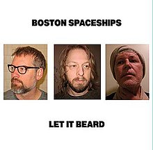 Plain white cover with the band name and album title printed in large black letters. In the center is a row of three photos, one for each band member (left to right, John Moen, Chris Slusarenko, Robert Pollard). In the photos they all sport beards/chin fuzz.