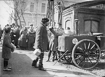 American Red Cross Officer, Lt. L.M. Foster with mobile, surplus army field kitchen at Novorossiysk Russia, three days before the City fell to the Reds, March 1920