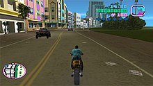 Gameplay screenshot of the player character driving a motorcycle through a busy city street.