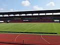 Grass field at the center of the stadium (with the Capas National Shrine seen on the background)