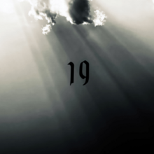 A black-and-white photograph of a cloud with rays of light shining through it, with the number 19 superimposed