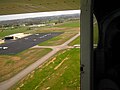 Just after takeoff, heading southwest from runway