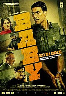 The poster features Akshay Kumar at left holding a pistol and taking cover behind a wall. At right appears title of the film, vertically.